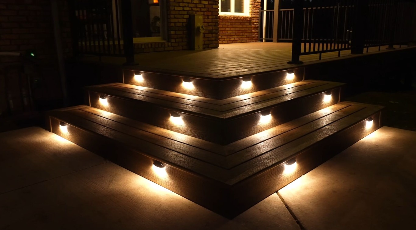 Deck stairs with integrated safety lighting at night in Oxnard, CA